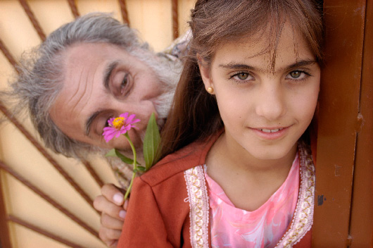 Adel Altai surprises Gilan Hassan with a flower, An Kawah, Iraq (Kurdistan)