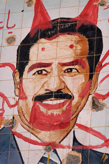 Defaced portrait of Sadaam Hussein, on ceramic tile, northern Iraq