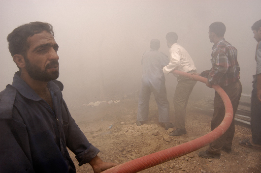 Marlboro man fights the fire, Baghdad, Iraq